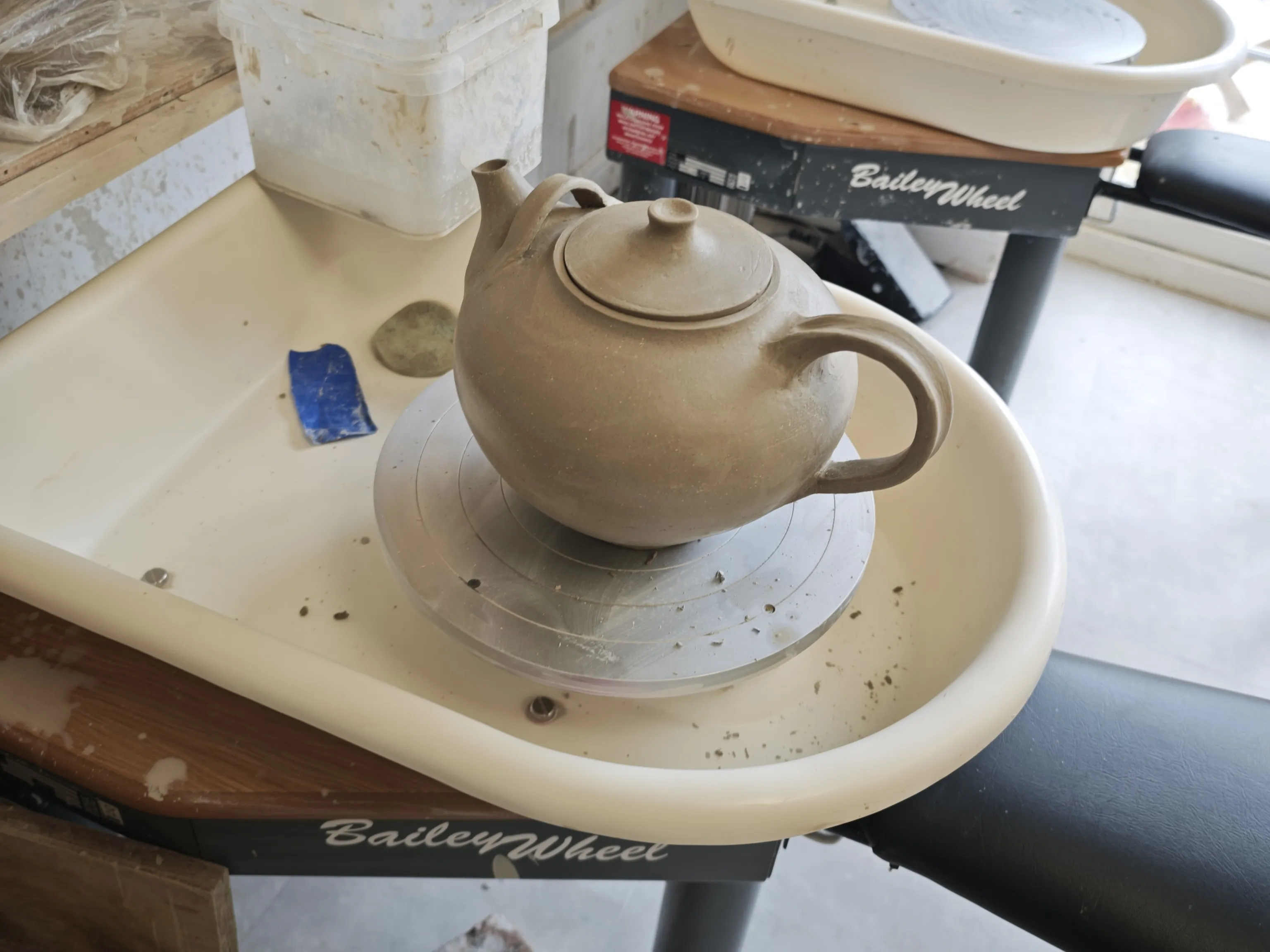 A teapot thrown at the studio